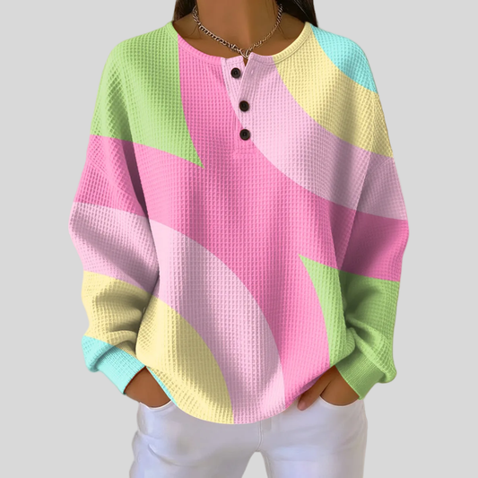 Bluza damska w pastelowy, abstrakcyjny wzór, z guzikami